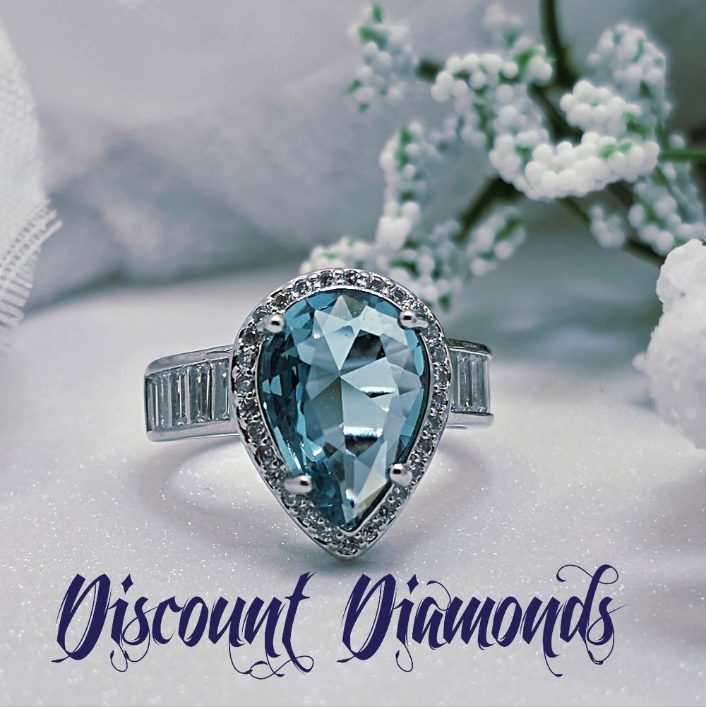 Aquamarine Cocktail Ring flanked by Round & Rectangular Cut Sapphire on 925
